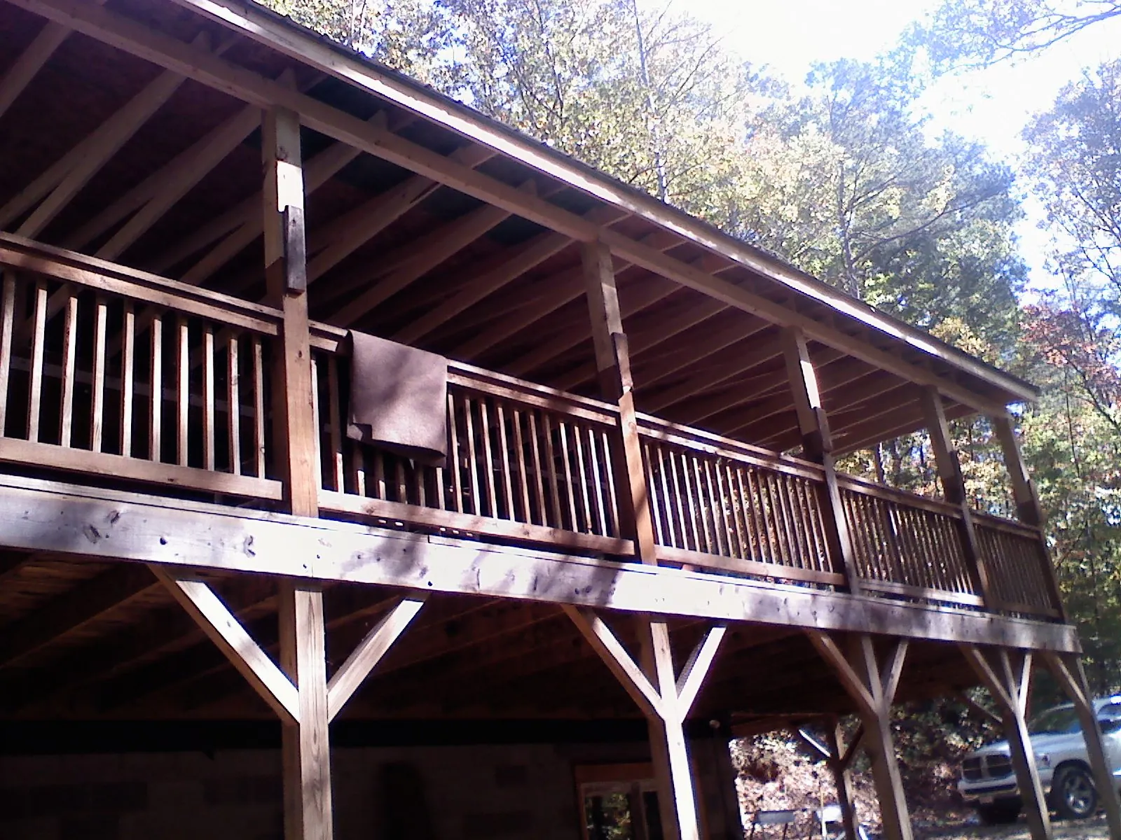 Timber framing under a new elevated porch and deck — Roof Leak Repair in Hutchinson by Roofing Brothers